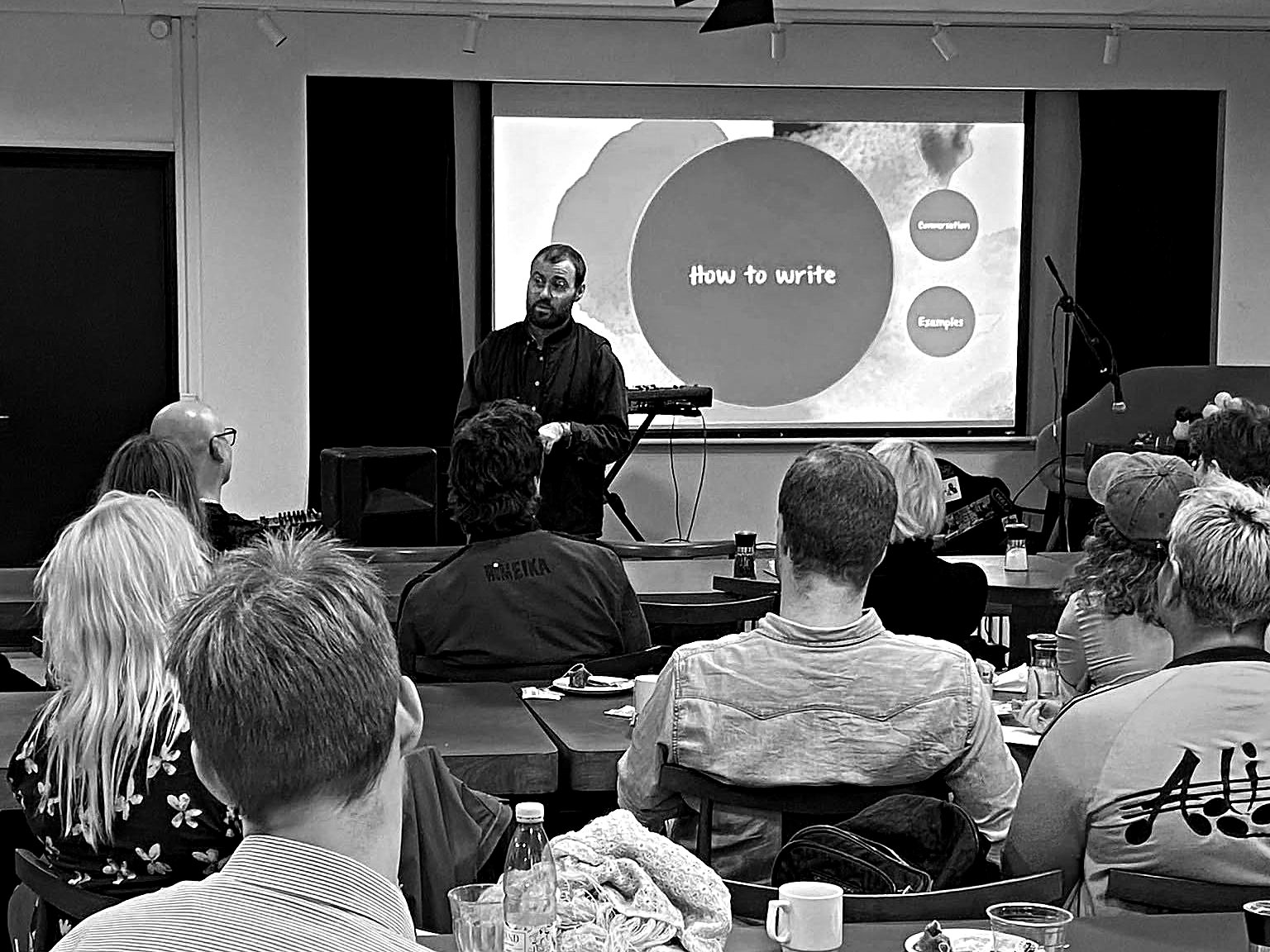 Marc Facchini giving a talk on songwriting